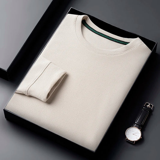 Camiseta de manga larga tipo gofre de cuello redondo para hombre, transpirable, cómoda y a la moda.