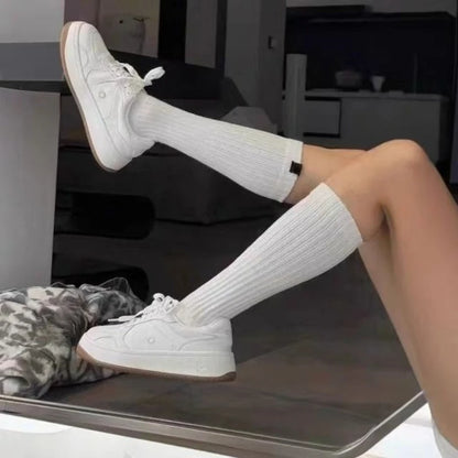 Genuine leather white shoes classic black and white running shoes.