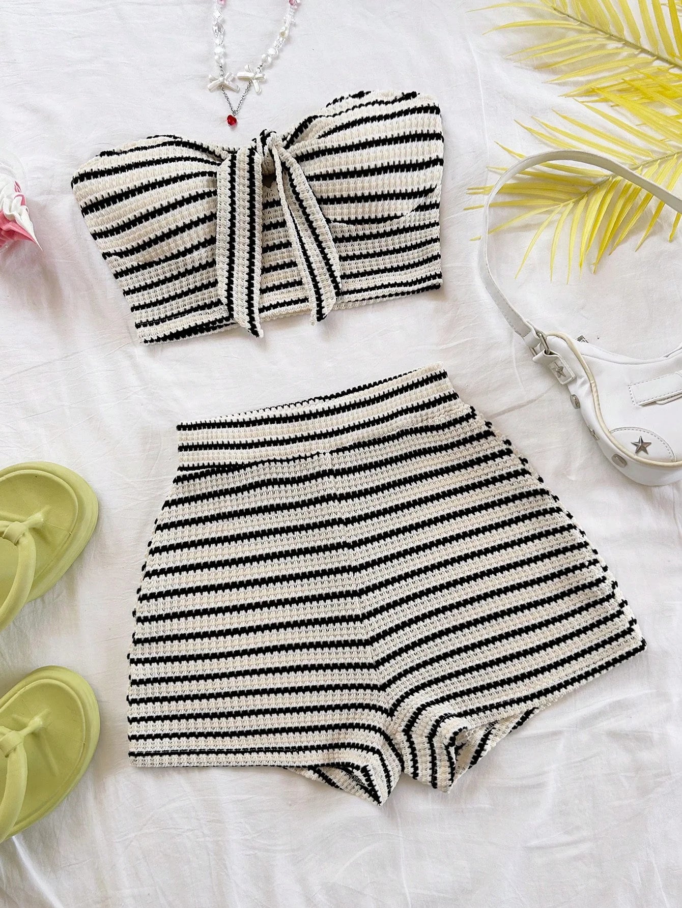 Women's Elegant 2-Piece Fashion Striped Set with Butterfly Detail Top and High-Waisted Shorts.