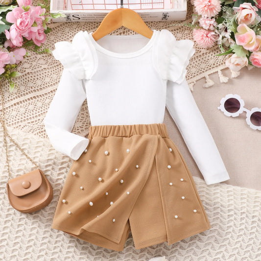Girl's neat color long sleeved round neck, elastic waist skirt pants set.