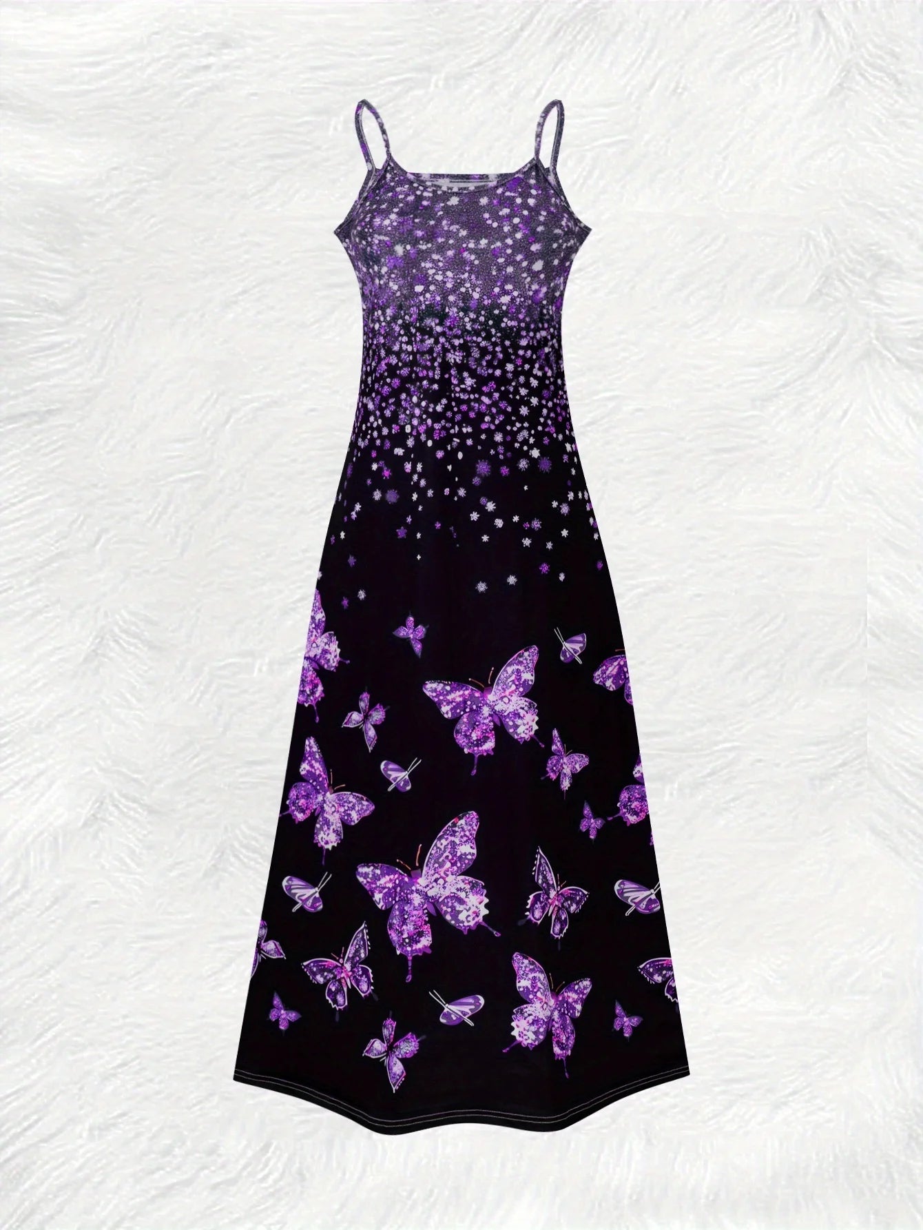 This round neck spaghetti strap maxi dress features a dazzling purple glitter, butterfly print on a sleek black base.